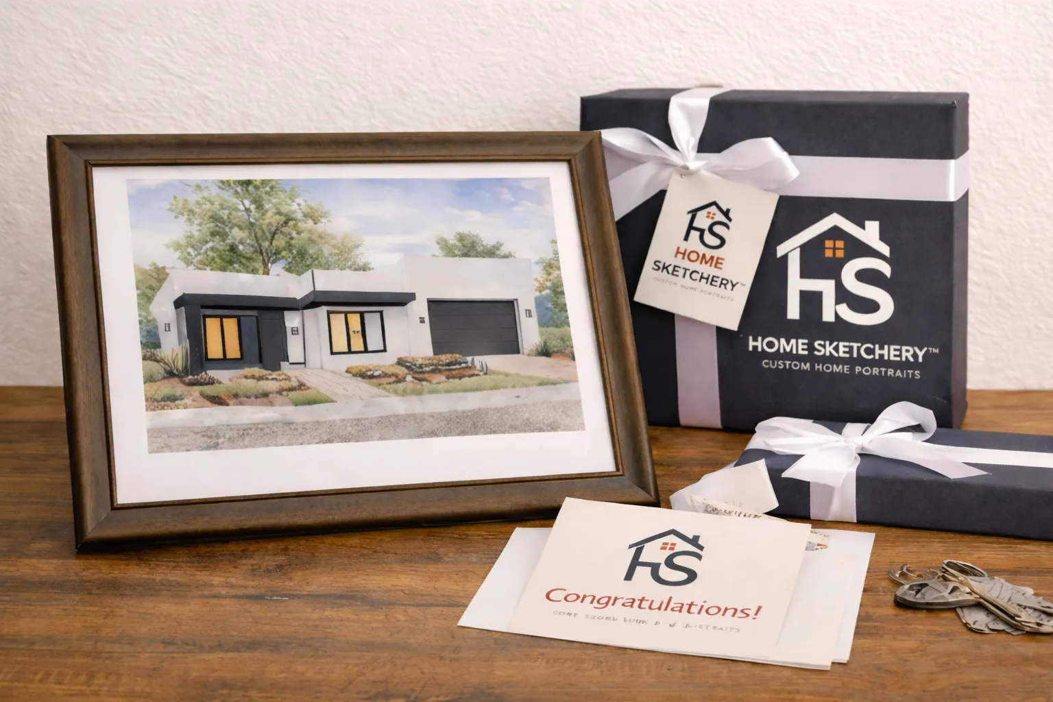 A framed home portrait presented with a Home Sketchery gift box